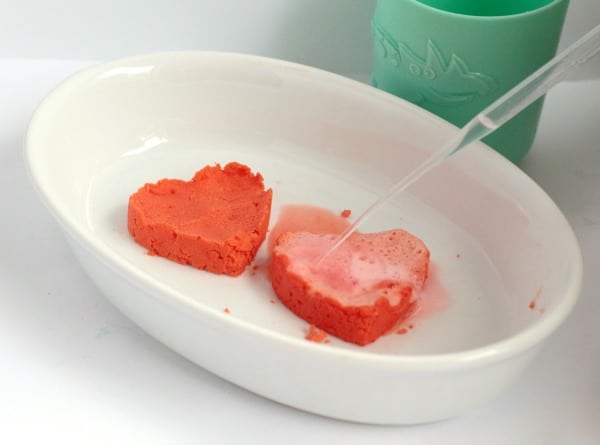 Transform classic baking soda science into something fit for Valentine's Day with these super-fun fizzing hearts reactions!