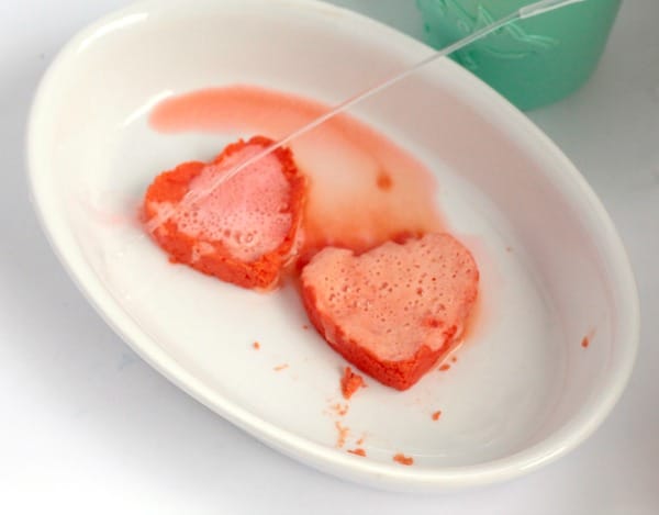 Transform classic baking soda science into something fit for Valentine's Day with these super-fun fizzing hearts reactions!