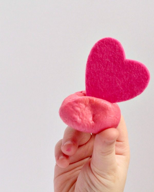 This Valentine's Day, make these bouncy balls using just borax, glue, and corn starch! Kids will be amazed at how easy it is to make a homemade bouncy ball!