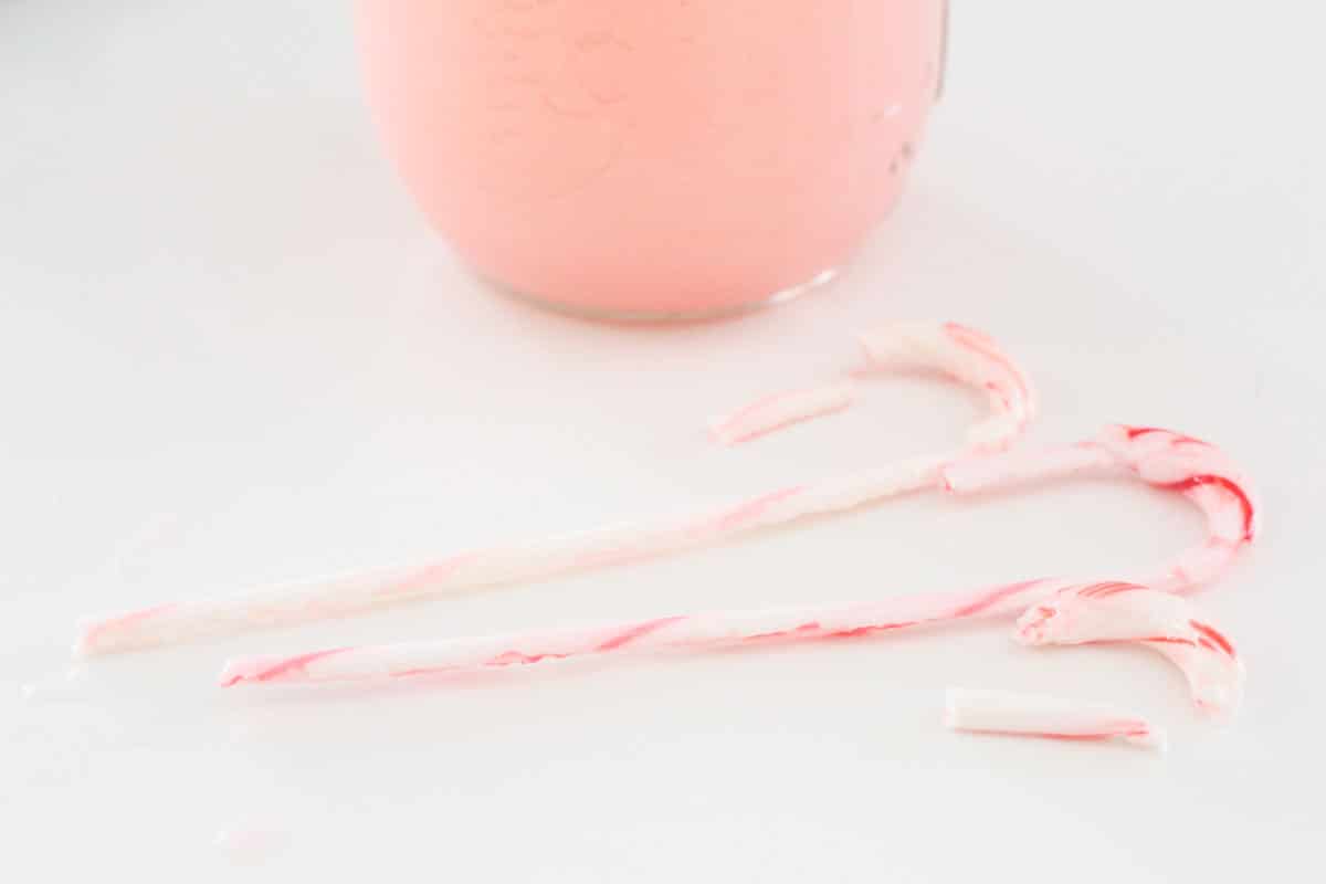 Make science magical in December with fun Christmas science projects, like this dissolving candy cane science experiment. Make science festive!