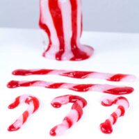 Mix Christmas and science with this fun Christmas STEM activity: making a candy cane slime recipe! Kids will love this hands-on science activity.
