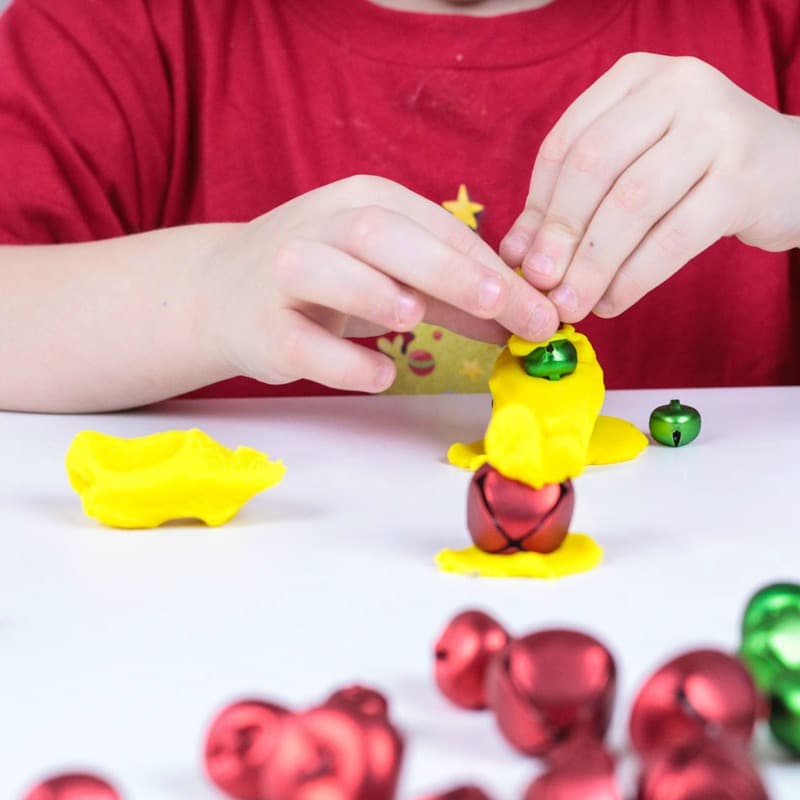 Make Christmas engineering accessible for preschool with this fun jingle bell engineering challenge! Christmas STEM activities have never been so fun!