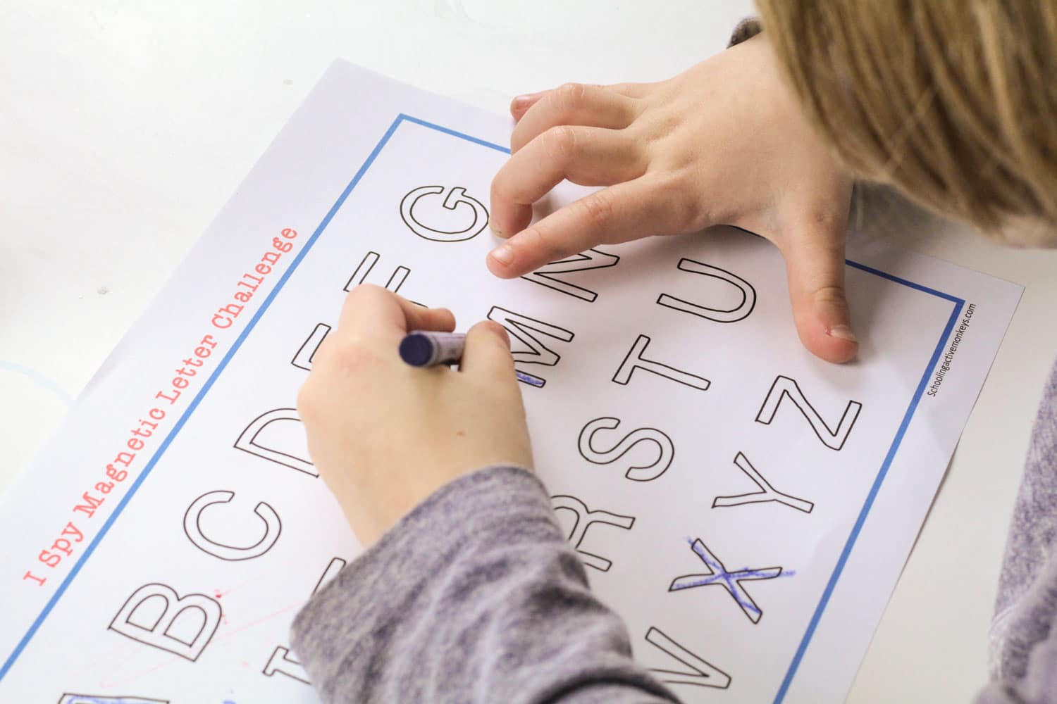 Make learning and recognizing letters fun with this seek and find magnetic letter matching game and printable! Just print and you're ready to play! #letteractivities #kindergarten #literacyactvities #freeprintables