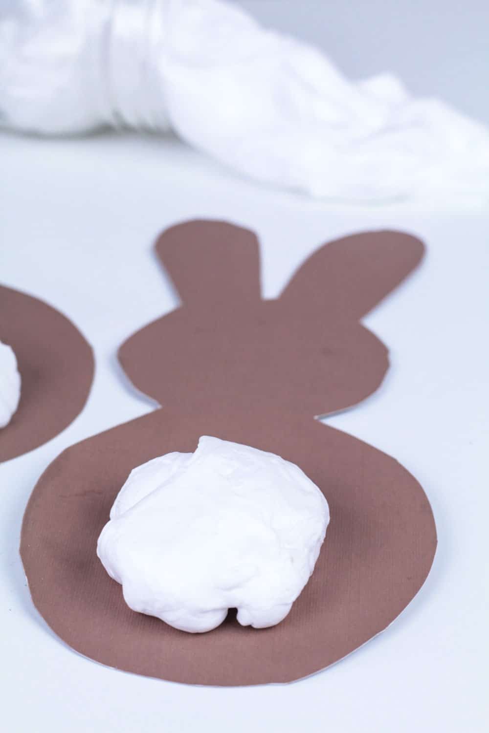 Calling all slime fans! This fluffy bunny tail slime recipe is the perfect slime recipe for Easter! The Easter slime is super fluffy and looks just like a bunny tail! Use the printable bunny template to make this slime activity even easier!