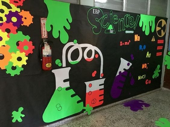 A science bulletin board decorated for halloween with beakers, flasks and test tubes