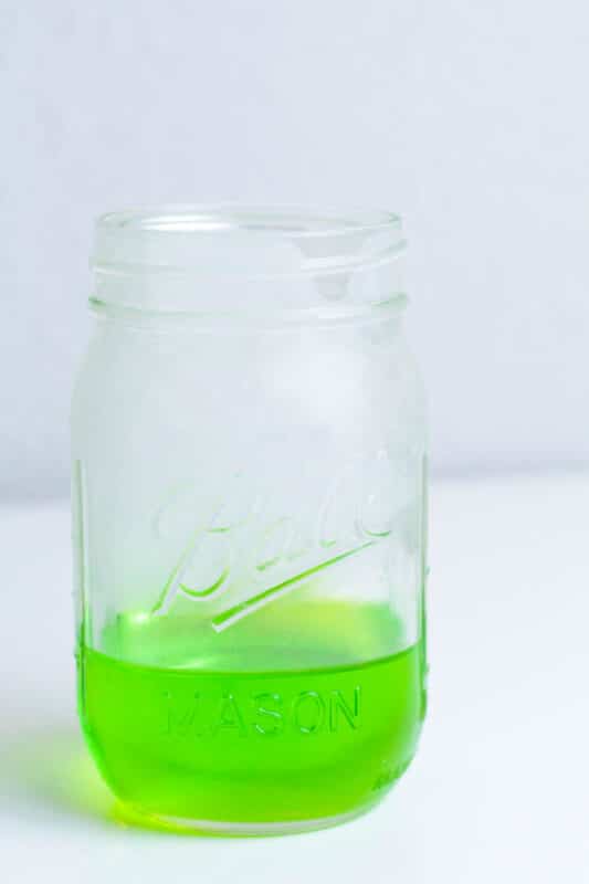 green sugar water in mason jar