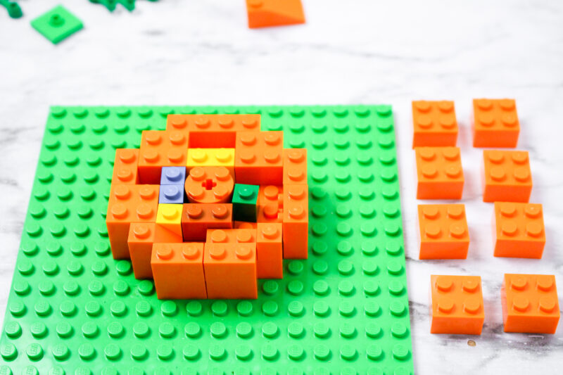 consisting of LEGO elements Pumpkin House Custom instruction 