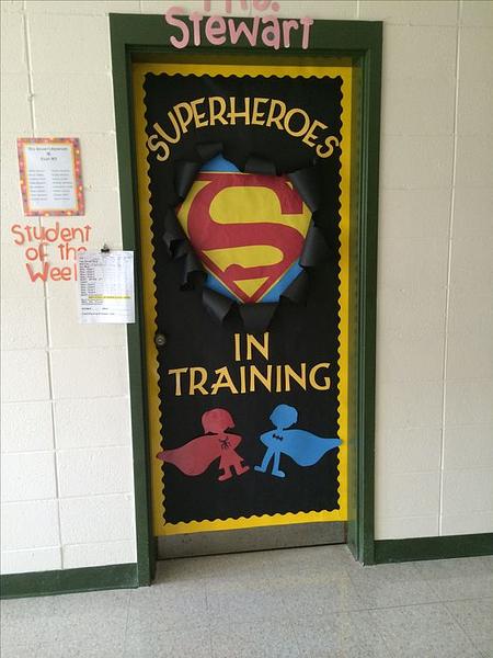 superheros in training classroom door