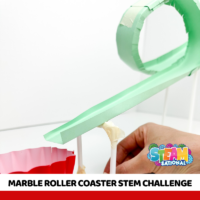 Make a paper roller coaster in this marble STEM challenge physics activity!